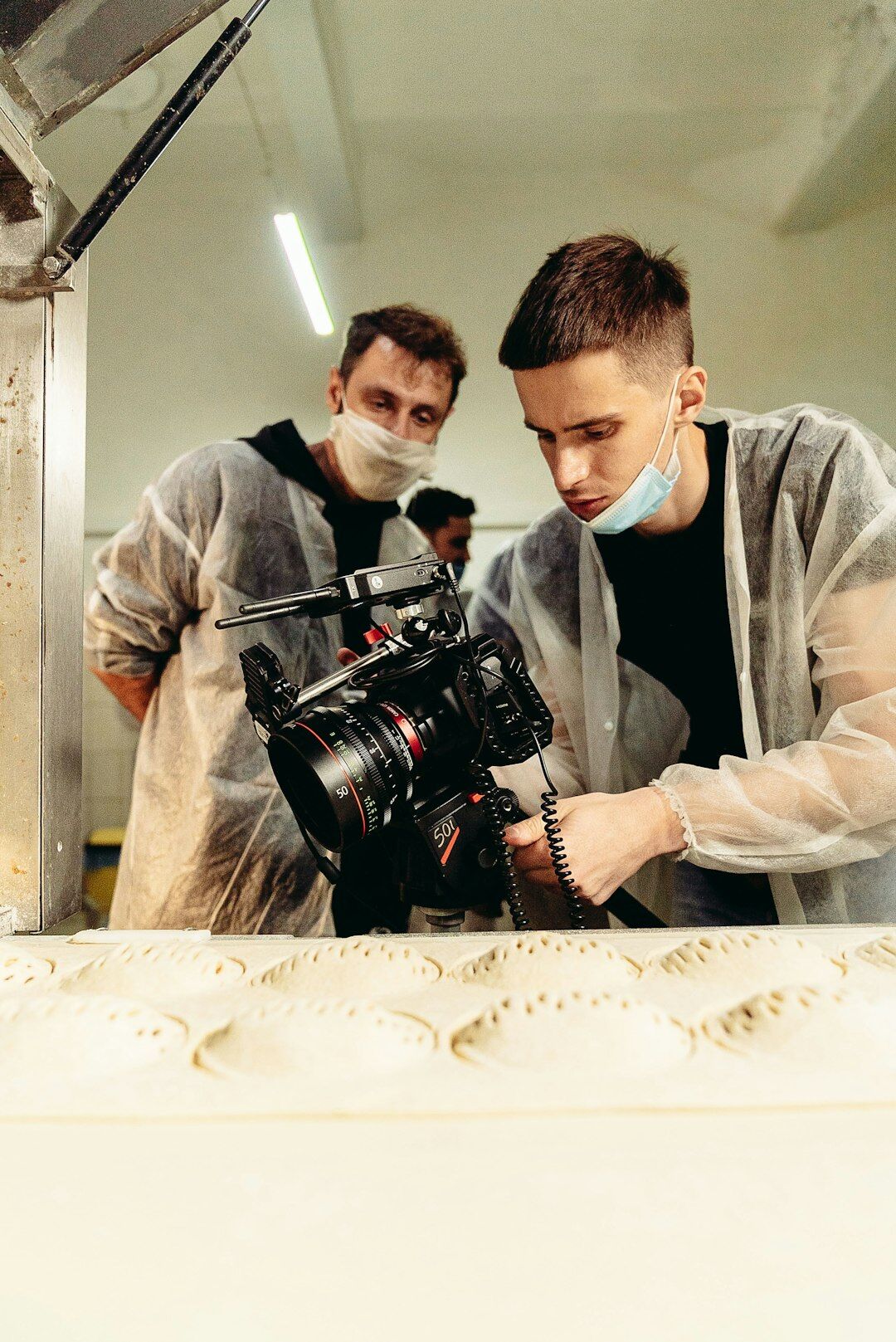 Production team reviewing footage on a laptop