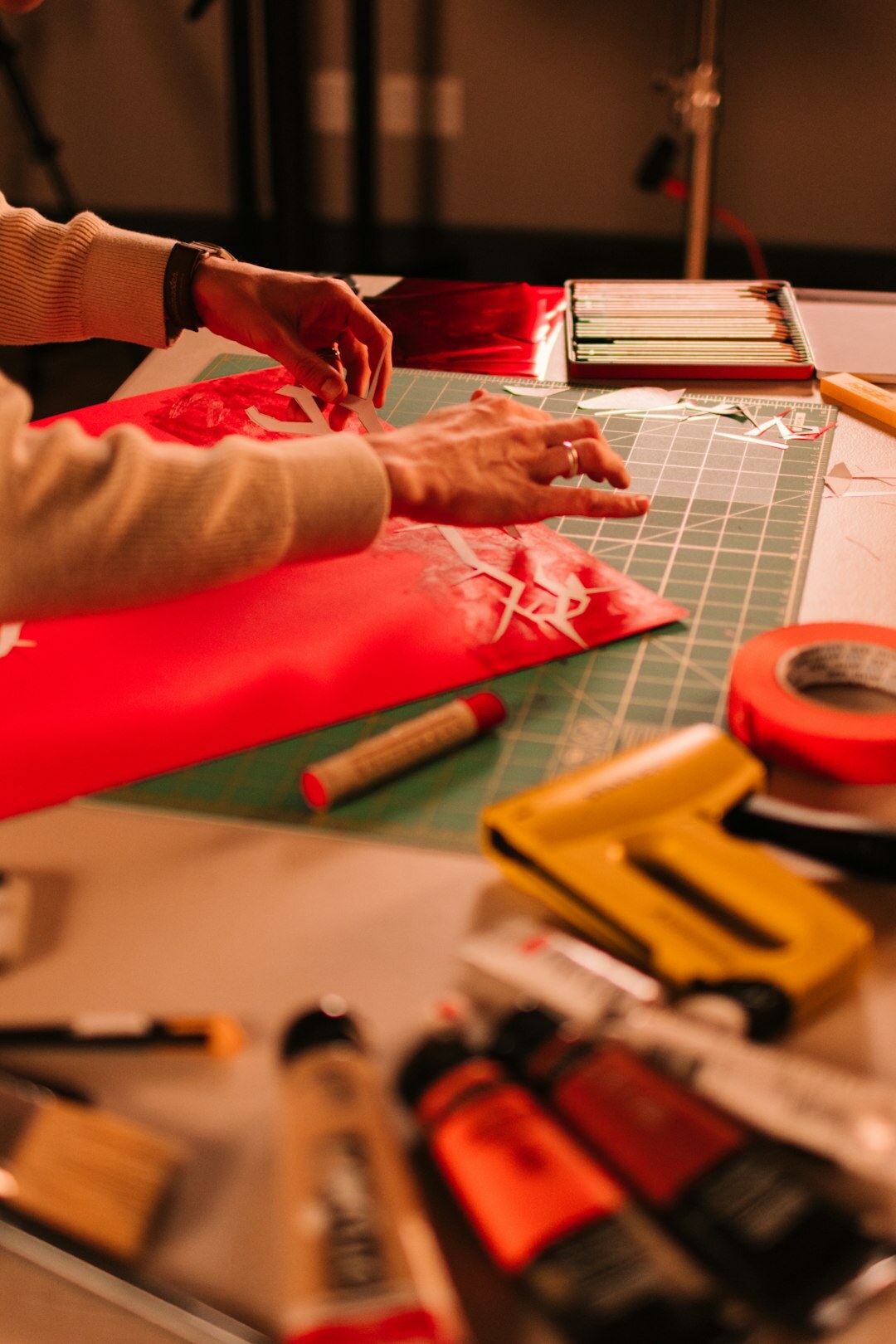 Production team meeting around a table in a studio